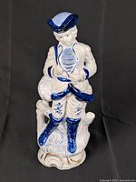 Full view of ceramic male figurine front