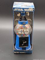 Front view of boxed M&M's Star Wars Han Solo candy dispenser