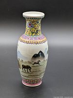 Full view of vase front showing horse scene and decorative borders