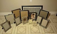 Group shot of all frames against wall