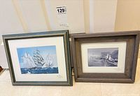 Both framed Neil Depew watercolours side by side