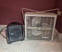 Air King box fan beside Bionaire space heater, size comparison