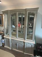 Front view showing entire cabinet, doors, finish and hardware