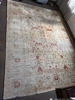 Full view of rectangular wool area rug on floor