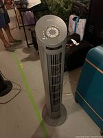 Full view of gray Seville Classics tower fan standing upright