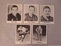 Front view of all five hockey cards