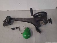Full view of Cannon downrigger with attached cable, mounting clamp and accessories