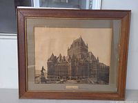 Full view of framed print showing Chateau Frontenac subject, wood frame, mat and glazing