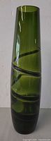 Full view of tall green glass vase showing overall form