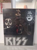 Full view of framed KISS mirror art