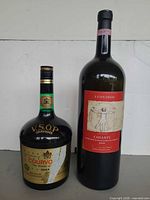 Front view of both the 5 L Leonardo Chianti bottle and Courvoisier ice bucket