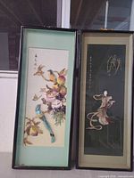 Both framed panels leaning side by side showing overall size and frame style