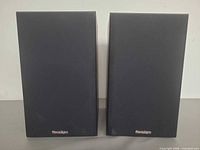 Front view of both Paradigm speakers with grilles