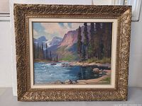 Frontal view of framed oil painting showing full artwork and frame detail
