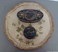 Group view of oval box, round box and Florentine tray
