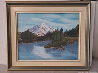 Full view of framed oil landscape painting