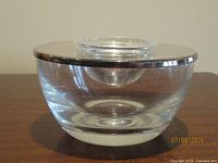 Assembled caviar server showing crystal bowl with silver-plated rim and inner dish