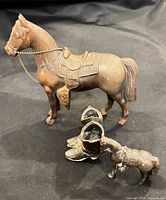 large horse, boots, small horse overview