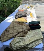 Overall table view with multiple folded fabrics and stacks