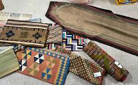 Overview of all seven rugs/runners laid on floor
