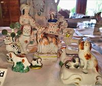Group shot of all miniature figurines on table