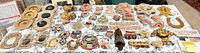 Full table overview of beaded appliqués, purses, frames and accessories