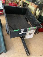 Full view of cart from front left showing tub, tongue, wheels
