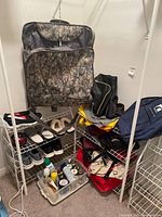 Overall lot view showing bags on shelves, shoes, grooming items