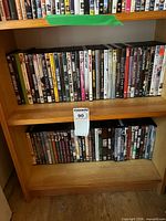 Full view of two shelf rows loaded with DVD movies
