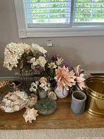 Overview of all items on wooden surface under window