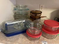 Group shot of all glass bakeware, storage bowls and juicer