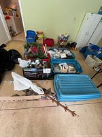 Overview of totes, boxed NOMA items, wreaths, garlands and assorted décor