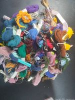 Top view of large pile of assorted embroidery threads