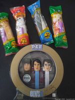 Overall lot showing Elvis boxed set with four bagged PEZ dispensers