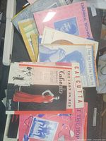 Top view of pile showing Calcutta, Lady in Red, At the Hop, Danke Schoen covers