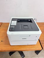 Top and front view of printer showing overall condition