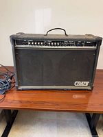 Front view of Crate 6130C XL amplifier on table, power cord visible