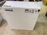Factory sealed Kohler box exterior
