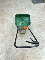 Top view showing green hopper, handle, adjustment dial