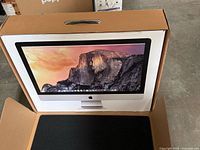 Retail box showing iMac front image