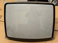 Front view of 19-inch color CRT with mounting tabs