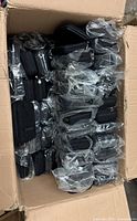 Carton filled with individually bagged black clickfree cases