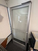Front view of full glass aluminum door