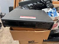 Front view of Dish ViP722k DVR on cardboard box