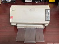 Front view of scanner with input tray folded down
