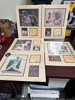 Overview showing four of the matted Kelly Russell Studios limited edition baseball prints