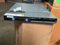 Front view of Lenovo ThinkServer RD230 showing two drive bays and branding