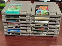 Two stacks of NES cartridges showing front and spine labels