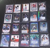 All 20 sleeved autograph and rookie baseball cards displayed in grid