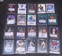 Full view of all 20 sleeved, top-loaded cards in four-by-five grid